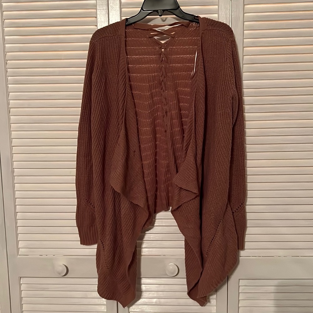 Tie detail asymmetrical cardigan.